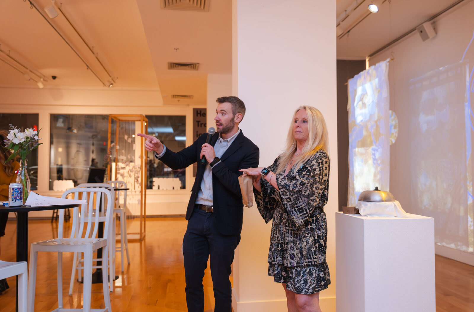 Zack speaking alongside his mom at an AFSP event