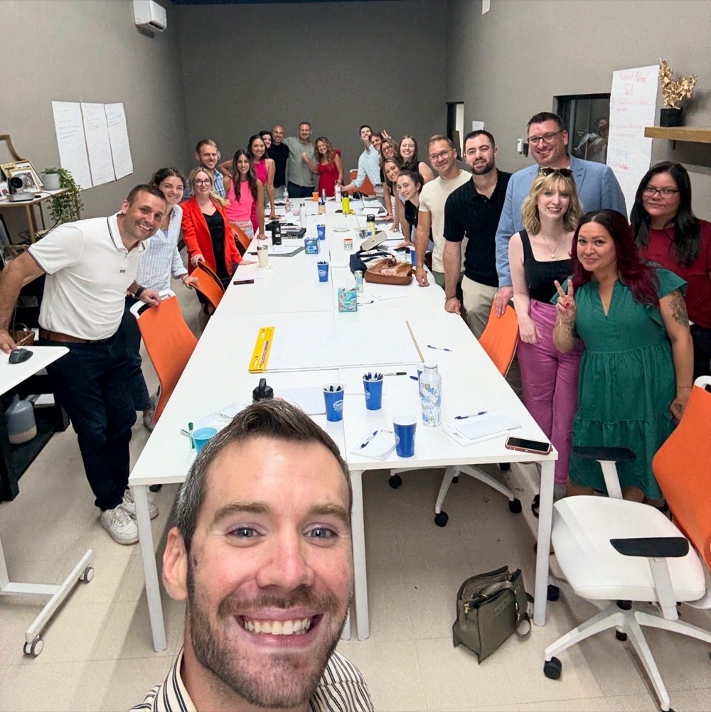 Zack working a planning day with a leadership team